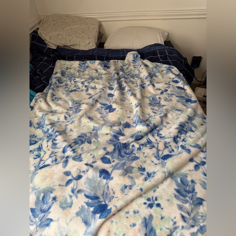 White and blue floral blanket